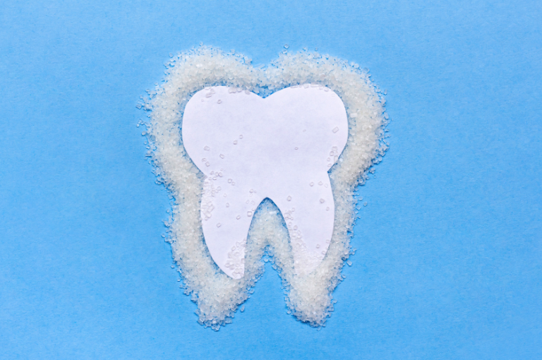 how sugar and acid damage your teeth